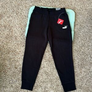 Puma regular fit sweat pants. New w/tags. Size M.